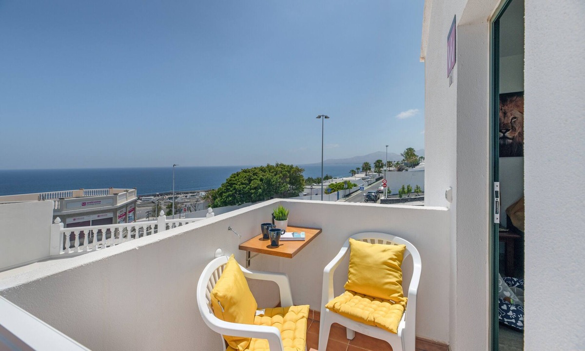 Puerto del Carmen Apartment | Vacation 'Bella Vista - Africa' with Sea View, Private Terrace and Wi-Fi