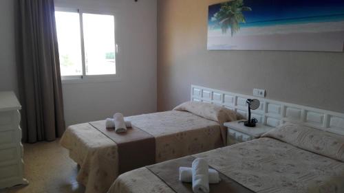 San Antonio Bay Apartment | Apartamentos Alba