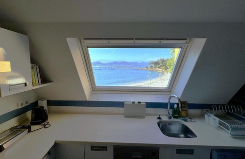 Oia Apartment | Atico en la playa de Canido - Homey Galicia