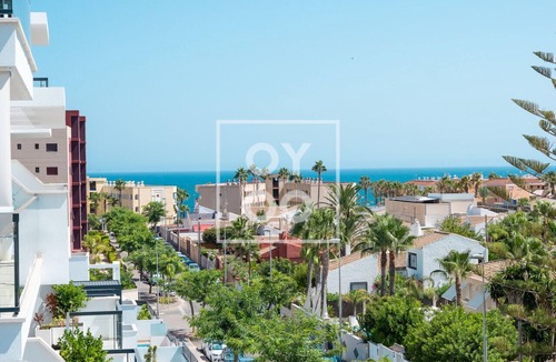 Mil Palmeras Apartment | Cobalt Canvas Residence, by OYOOSTAYS