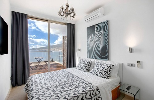 Tabaiba Apartment | Holiday Apartment 'Mirador Terrazas Del Mar' with Shared Pool and Air Conditioning