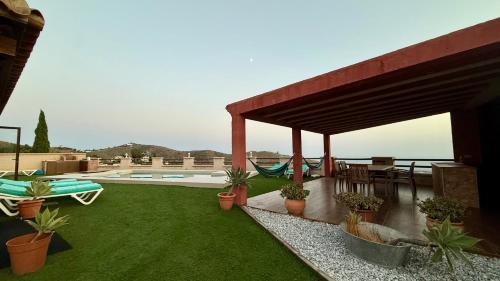 Torrox Ski Chalet | LA CASA ROJA Casa privada con piscina y vistas Zona Torrox