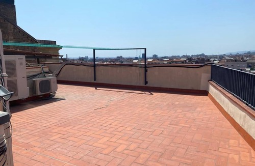Sant Gervasi – la Bonanova Apartment | Large double bedroom with desk, double bed, large wardrobe and window.