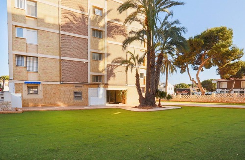 La Zenia Apartment | Look out over the sea from the balcony of this spacious apartment and relax.