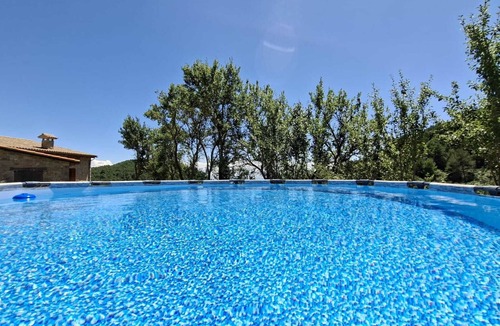 L'Espunyola Cottage | Masia Casa Comamorera - Rural House in the Forest - swimming pool and Montserrat views