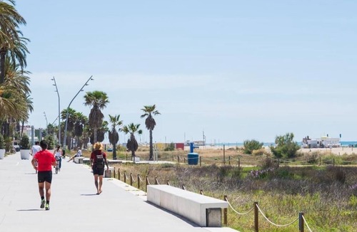 Castelldefels Apartment | Sunny apartment close to the beach with Pool, Garden, Terrace, Balcony, A/C & Wi-Fi
