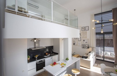 Quatre Carreres Apartment | This loft in Valencia has 1 bedroom and capacity for 4 people.The loft has 90 m².It is located 600 m from the supermarket, 900 m from the metro.The accommodation is equipped with the following things: lift, garden furniture, terrace 30 m², iron, hair d