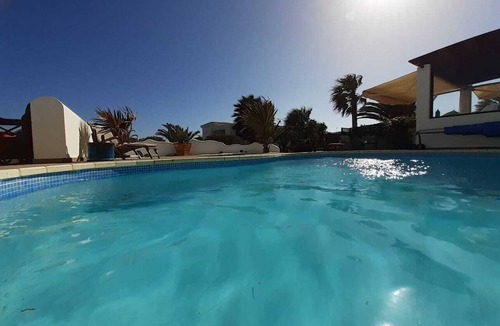 Montana Roja Villa | Tranquil setting, sea view, heated pool & Hot Tub, sub-tropical garden.