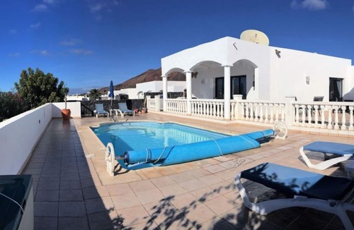 Playa Blanca Villa | Villa Teneguia, Luxury 3 bedroomed villa with sea views child safe gates