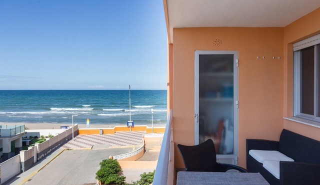 Beachfront Apartment 25 Minutes from Valencia with Shared Pool