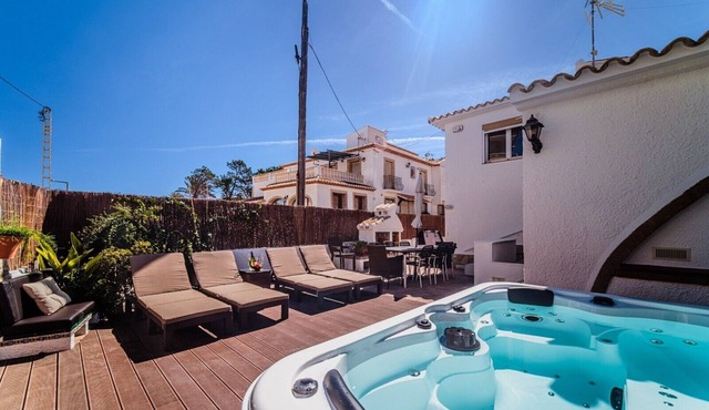 Holiday Home 'Jávea - Just Steps from the Sea' with Private Terrace, Wi-Fi & AC