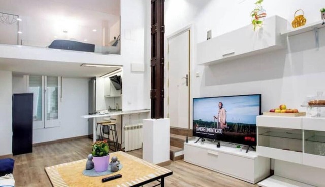 Industrial-style duplex apartment in Centro