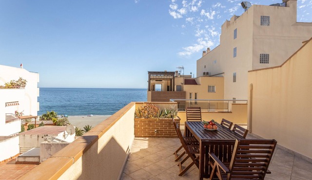 Penthouse "Mediterranean Attic" Near the Beach with Sea Views, Balcony, and Wi-Fi