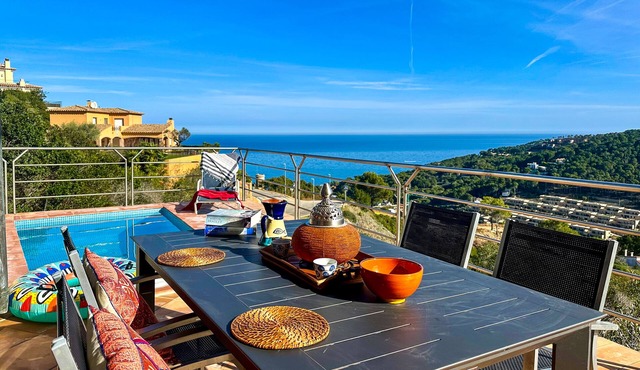 Villa with stunning sea views and pool in terrace.