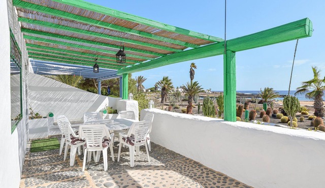 Wonderful Holiday Home “Villa Flores” Directly on the Beach with Sea View