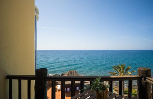Playa del Aguila Ski Chalet | Altamar 60 Balcony beach views By CanariasGetaway