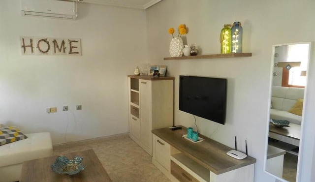 Apartment Playa Flamenca with Pool, A/C, Terrace & Garden